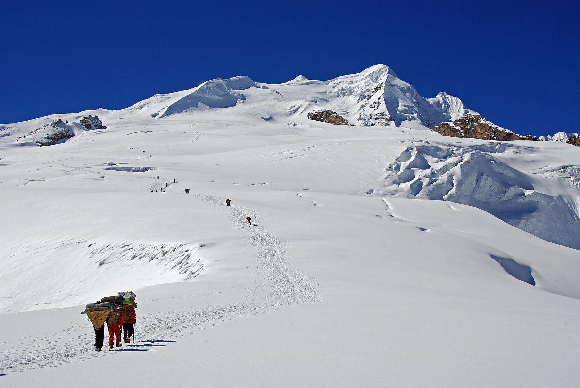 12 06 Porters And Trekkers Climbing From Mera La Towards Mera High Camp With Mera Peak Central Summit, Mera Peak North Summit